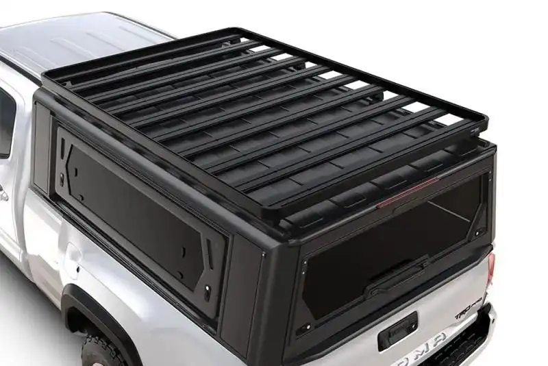 Toyota Tacoma (2015-2023) Alu-Cab Contour Canopy Slimline II Rack Kit  - The lightweight and durable Slimline II Roof Rack Kit will massively increase the gear-carrying capacity of the Alu-Cab Contour Canopy on your Toyota Tacoma. This versatile and modular rack can be customized to safely carry extra camping, sports, or other gear on any type of Tacoma adventure.