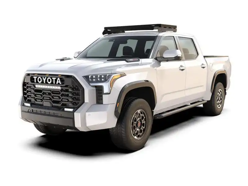 Baca Slimline para Toyota Tundra (3rd Gen) Cabina sobre caravana - Prepara tu Toyota Tundra Cab Over Camper para tareas de transporte de carga y cualquier aventura con este juego de baca Slimline II que contiene una baca Slimline II, un deflector de viento y 2 rieles. La baca portaequipajes es compatible con ms de 55 accesorios adaptados a diversos equipos deportivos, de campamento y overland.